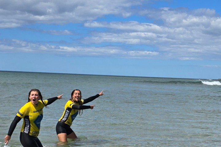 a group of people in a body of water